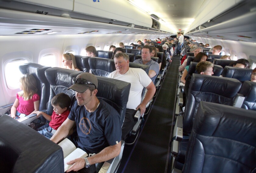 Passengers on an Allegiant Air flight from Los Angeles to Medford, Ore. A study found that tray tables were the most unsanitary surface on a plane.