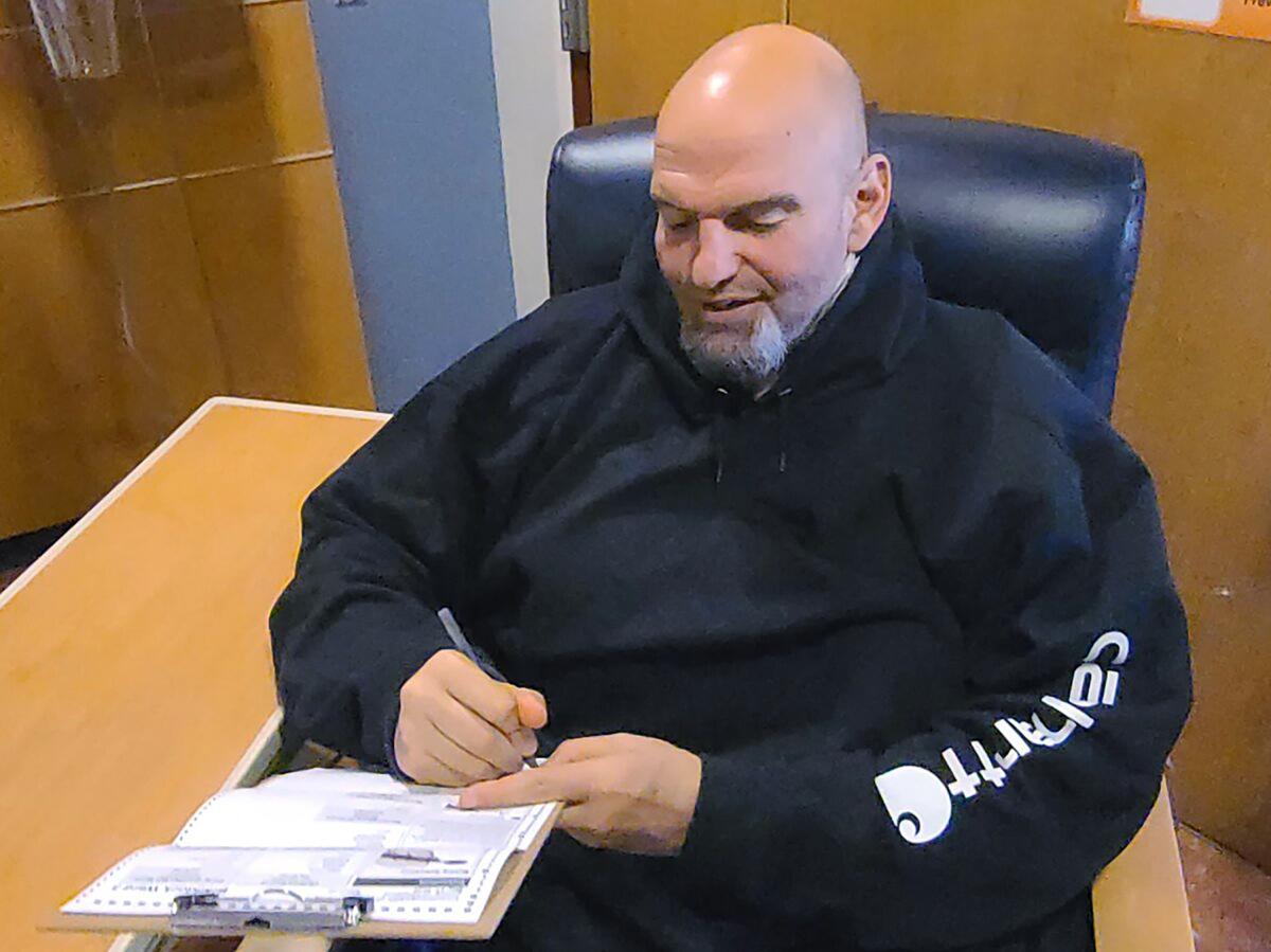 John Fetterman fills out his emergency absentee ballot.