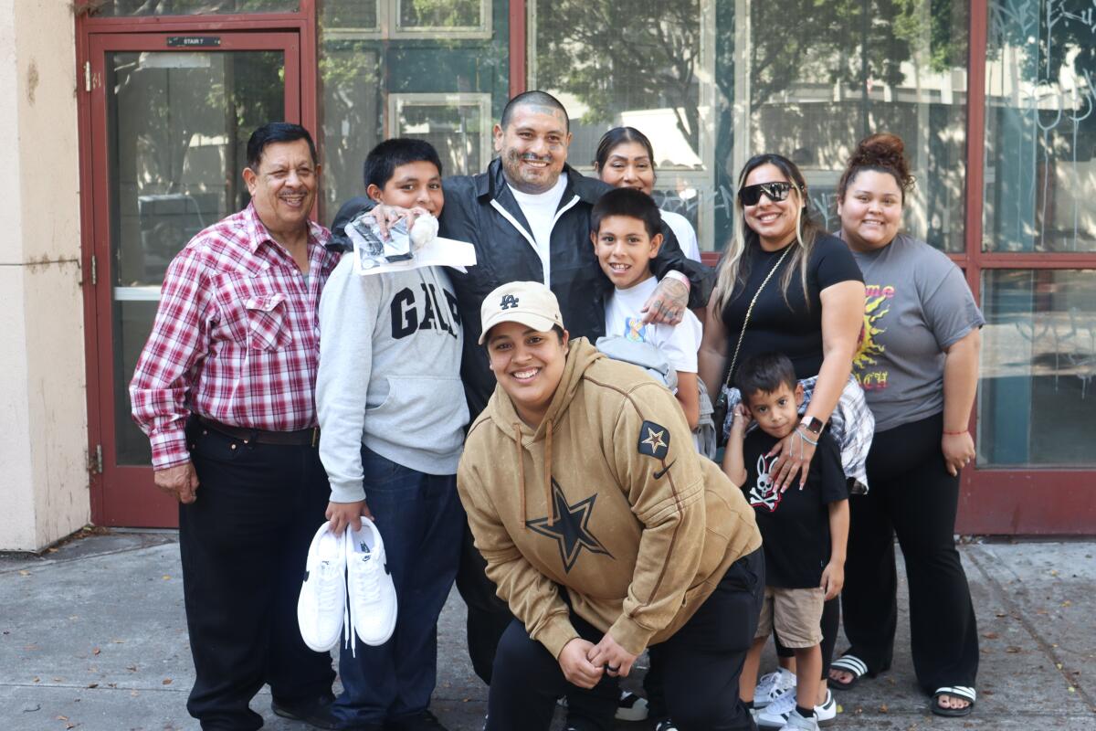 Jose Olivares with his family Wednesday, after he was released from Los Angeles Sheriff Men's Central Jail on $100,000 bond.