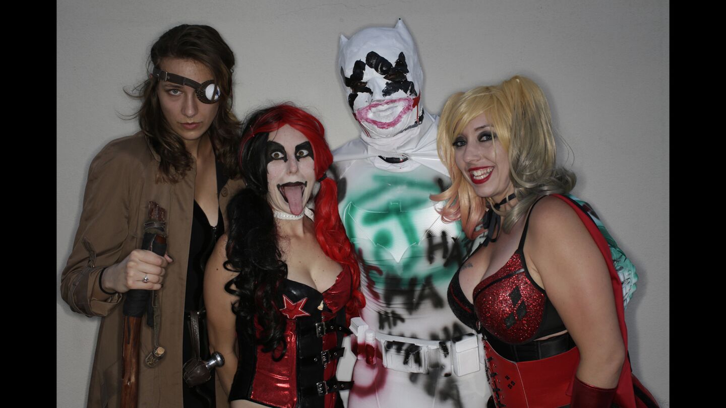 From left, Casy Hayes as Alistair "Mad Eye" Moody from the Harry Potter series, Arieanne Bewarder as Harley Quinn, Saemlinh Inmany as a Jakk's Toy Batman and Stephanie Inmany as Harley Quinn.