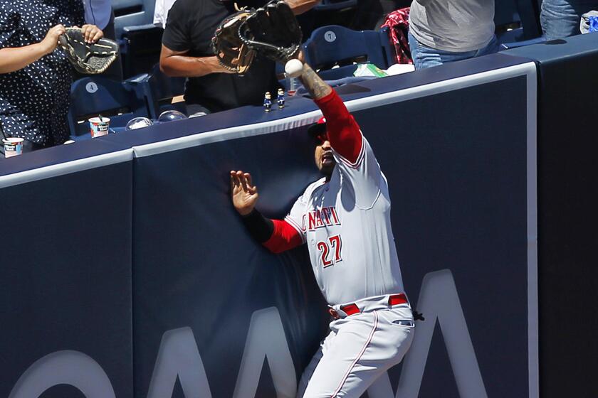 Cincinnati Reds' Matt Kemp can't make a catch on a two-run double by San Diego Padres' Wil Myers in the third inning on Sunday, April 21, 2019 at Petco Park in San Diego, Calif. (K.C. Alfred/San Diego Union-Tribune/TNS) ** OUTS - ELSENT, FPG, TCN - OUTS **