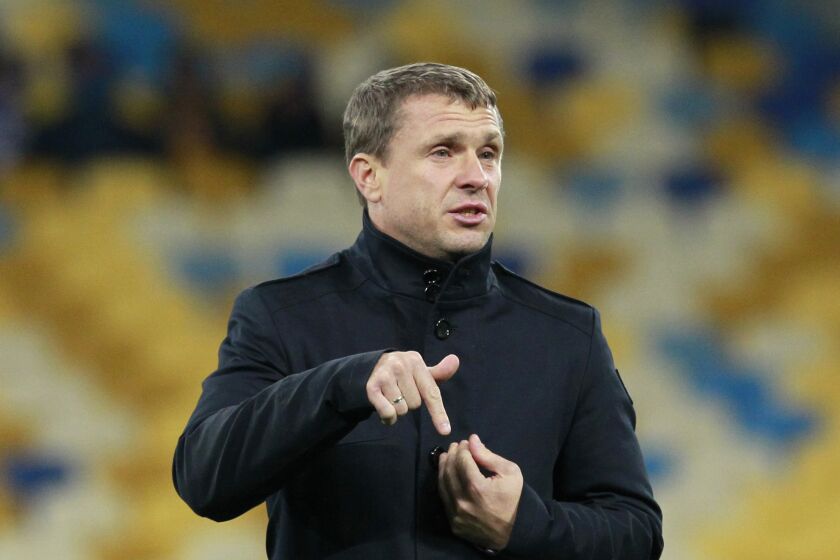 FILE - Kiev's headcoach Serhiy Rebrov talks prior to the Champions League round of sixteen first leg soccer match between Dynamo Kiev and Manchester City in Kiev, Ukraine, Wednesday, Feb. 24, 2016. Ukraine has appointed former Tottenham striker Serhiy Rebrov as coach of the men’s national soccer team as it aims to qualify for next year’s European Championship despite being unable to play at home because of the Russian invasion. (AP Photo/Sergei Chuzavkov, File)
