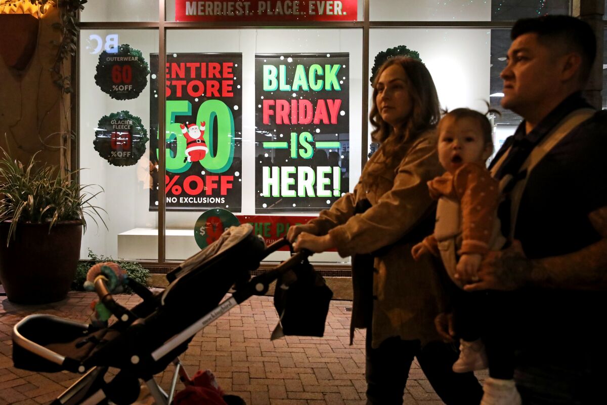Shoppers enjoy exclusive Black Friday deals at the Citadel Outlets in Commerce.
