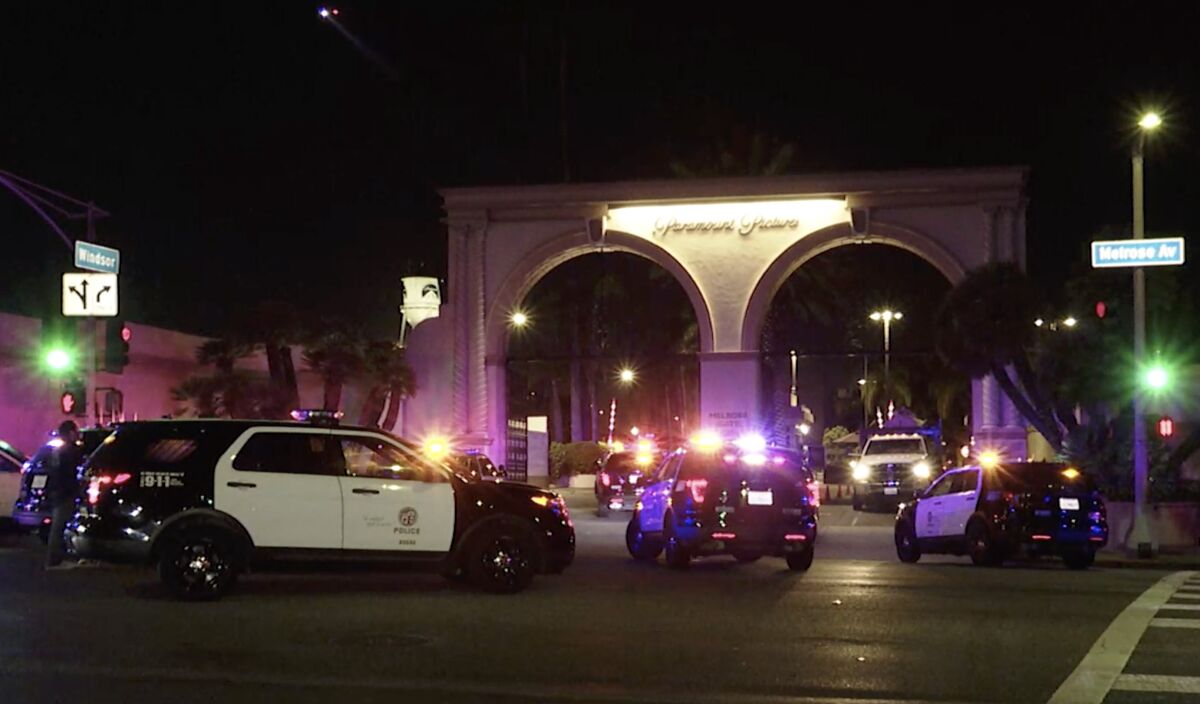 Police converge on the Paramount Pictures lot in Hollywood on Sunday night.