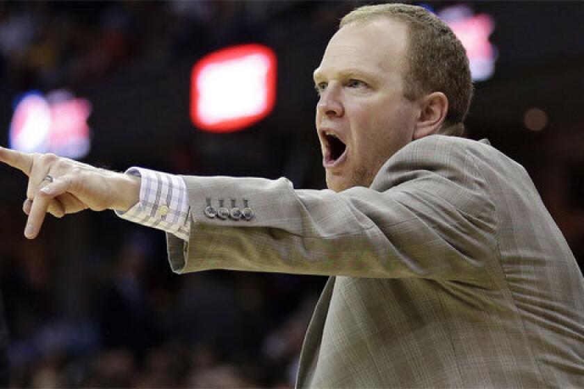 Brooklyn assistant coach Lawrence Frank yells to players during a game in October. He has since been reassigned to a non-bench role.