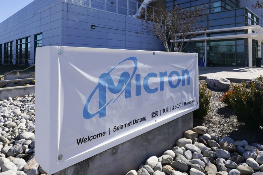 FILE - A sign marks the entrance of the Micron Technology automotive chip manufacturing plant on Feb. 11, 2022, in Manassas, Va. Japan is providing a major U.S. chipmaker a subsidy of up to 46.6 billion yen ($322 million) to support its plan to produce advanced memory chips at a Hiroshima factory, the Japanese trade minister said Friday, Sept. 30, 2022. (AP Photo/Steve Helber, File)