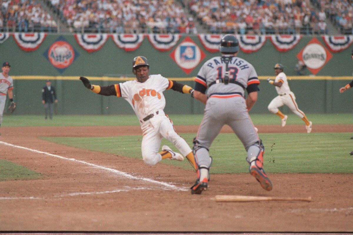 Alan Wiggins, slides past Detroit catcher Lance Parrish to score a run in Game 2 of the 1984 World Series, still the only Series game the Padres have ever won.