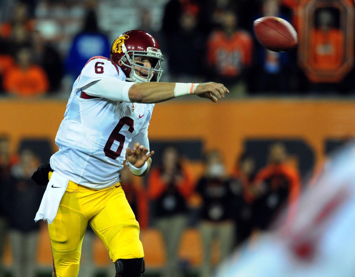 USC quarterback Cody Kessler fires a pass in the second half against Oregon State. Kessler shook off an interception returned by the Beavers for the tying touchdown with a 73-yard scoring pass to Marqise Lee and finished the night 17 of 21 for 247 yards.