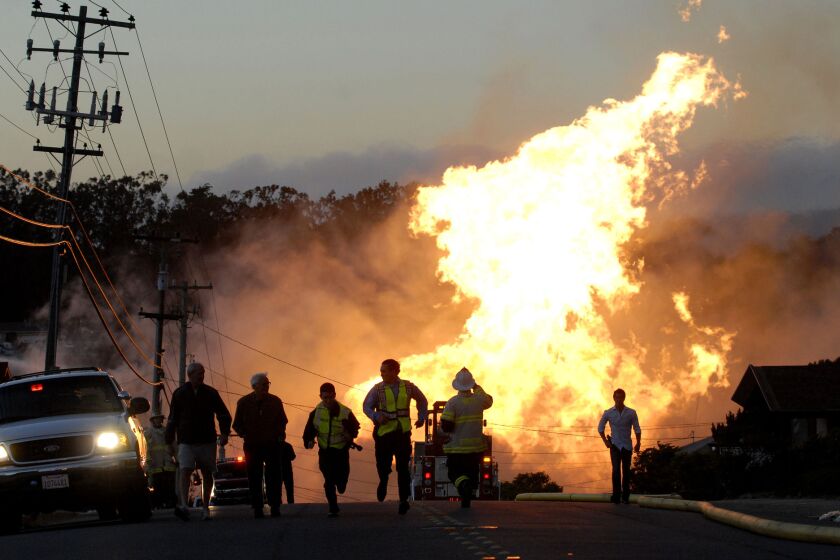 Flames billow in the hills above San Bruno, Calif., after the pipeline explosion that killed eight in 2010. On Thursday, a Senate bill that would have prevented Pacific Gas and Electric Co. from taking tax deductions on the $1.6 billion in financial penalties imposed on it by the state after the explosion failed to pass.