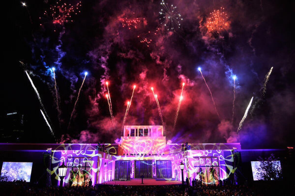 Fireworks explode over the George W. Bush Presidential Library and Museum during the dedication of the nation's newest presidential library.