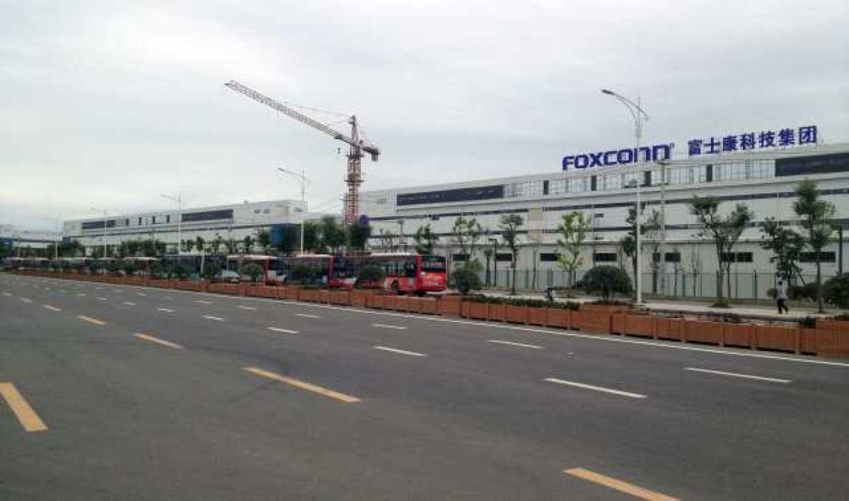 After reports of dangerous working conditions at Foxconn¿s Chinese factories, Apple and its suppliers agreed to allow the Fair Labor Assn. to inspect three Foxconn facilities in February and March. Above, the Foxconn factory in Chengdu, China.