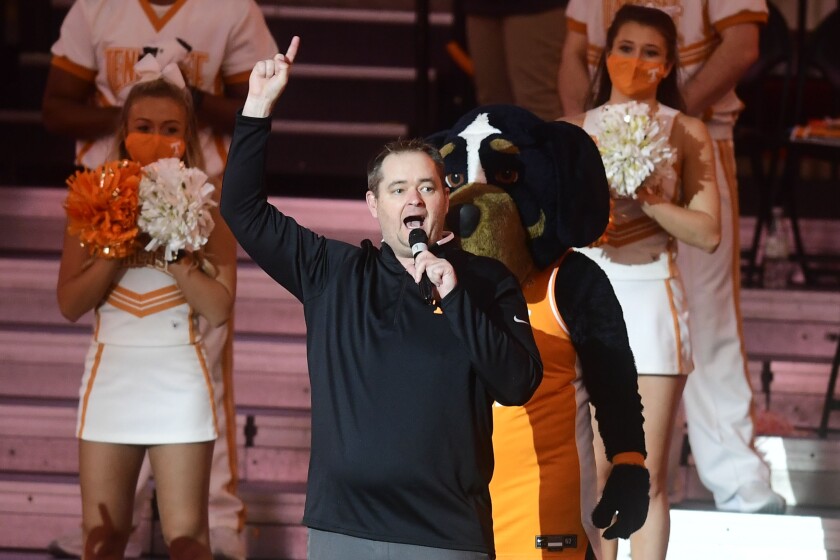 New Tennessee football coach Josh Heupel speaks during a college basketball game between Tennessee and Kansas in Knoxville, Tenn., Saturday, Jan. 30, 2021. (Caitie McMekin/Knoxville News Sentinel via AP, Pool)