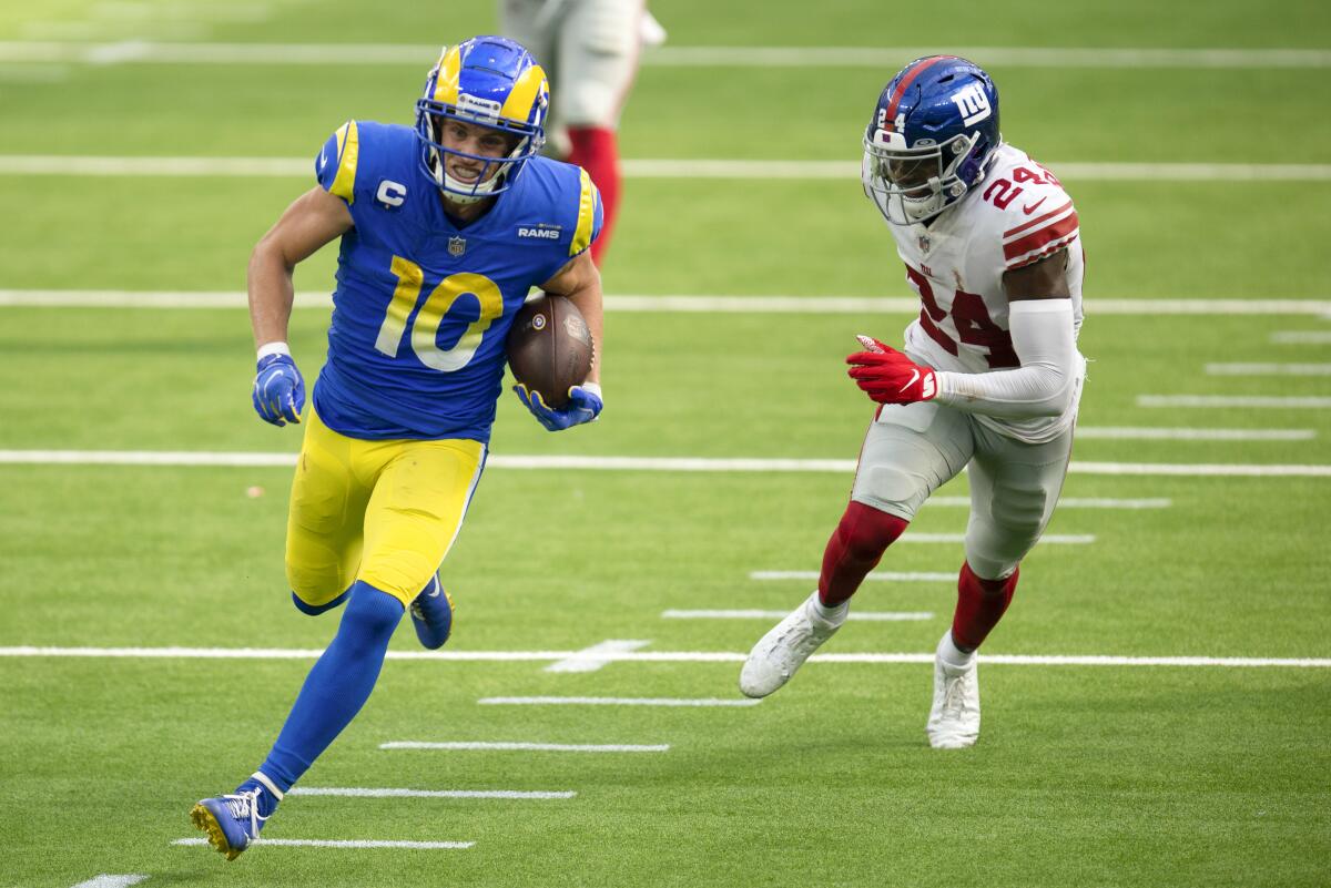 Rams wide receiver Cooper Kupp sprints for a touchdown past New York Giants cornerback James Bradberry 
