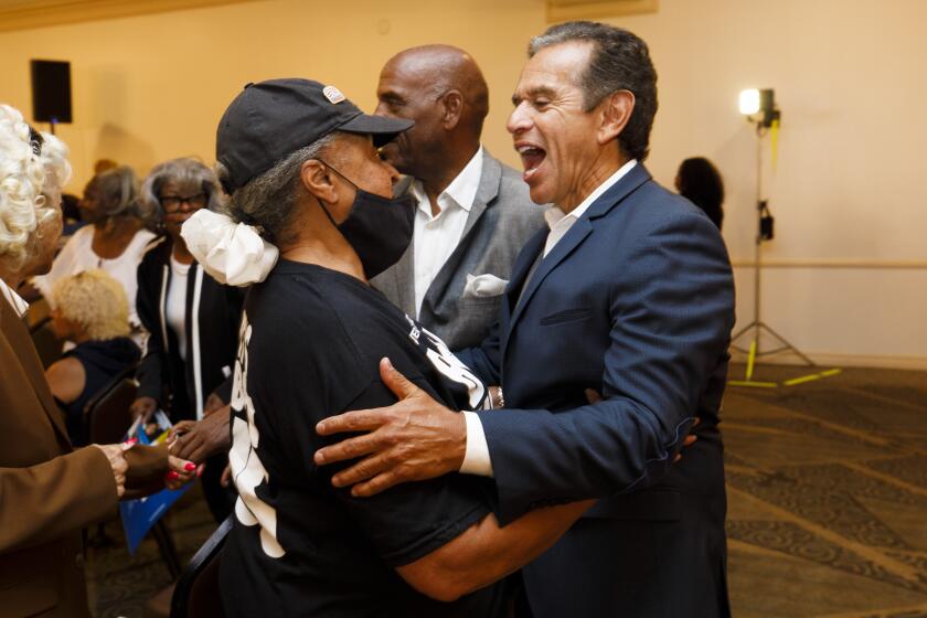 Los Angeles, CA - July 26: Former Los Angeles Mayor Antonio Villaraigosa greets members of a rally in support of Vice President Kamala Harris' presidential campaign at the Proud Bird Event Center on Friday, July 26, 2024 in Los Angeles, CA. (Carlin Stiehl / For the Times)