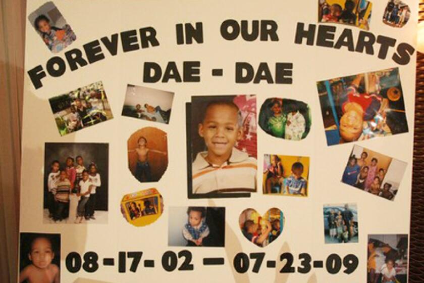 An array of photos at the Long Beach mortuary handling arrangements for Daevon Bailey chronicles the life of the 6-year-old, who was found dead last week.