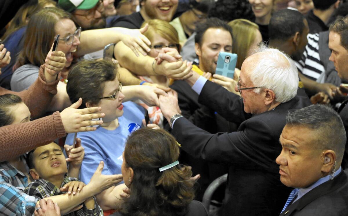 Vermont Sen. Bernie Sanders greets supporters after speaking at a campaign rally in Toledo, Ohio, on March 11.
