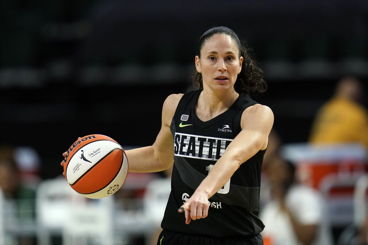Seattle Storm's Sue Bird directs her team against the Las Vegas Aces in the second half of a WNBA basketball game Saturday, May 15, 2021, in Everett, Wash. The Storm won 97-83. (AP Photo/Elaine Thompson)