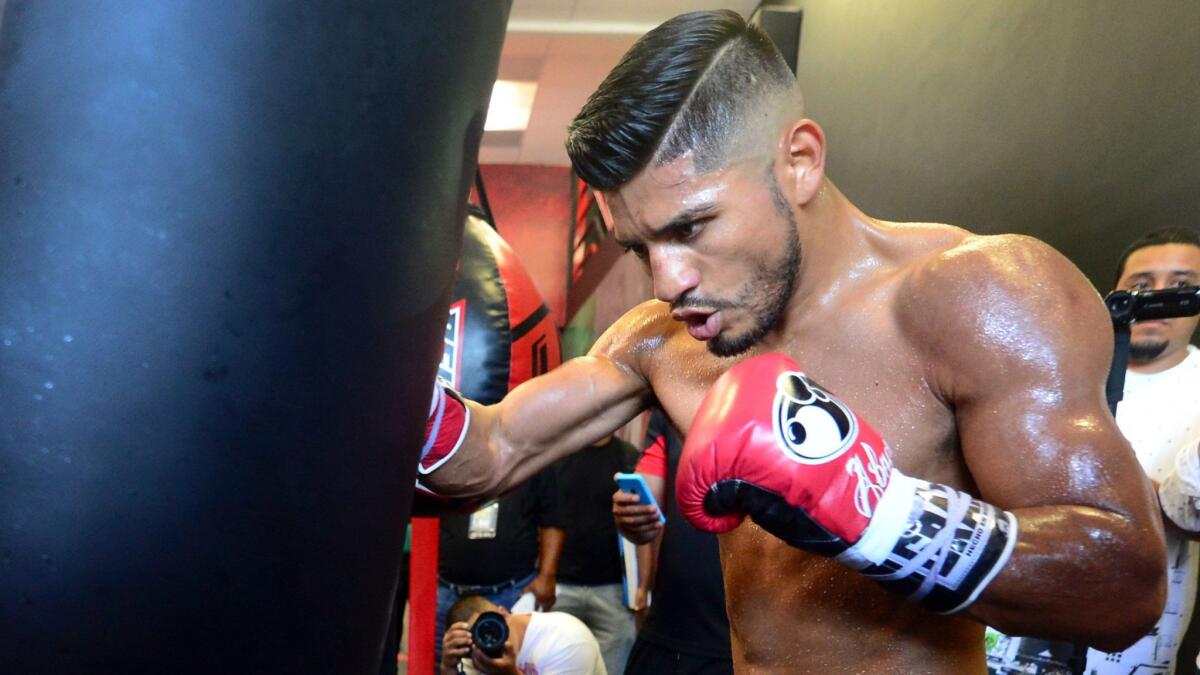 Abner Mares works out for the media on Aug. 18, 2015, in Bell Gardens.