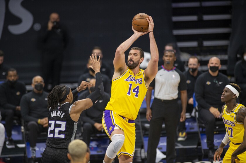 Lakers center Marc Gasol shoots over Sacramento Kings center Richaun Holmes.