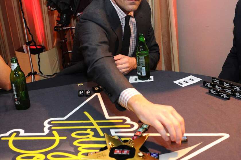 "Mad Men" star Jon Hamm plays the Hollywood Domino game at the 5th Annual Hollywood Domino Gala & Tournament presented by Bovet 1822 at the Sunset Tower Hotel in Los Angeles.