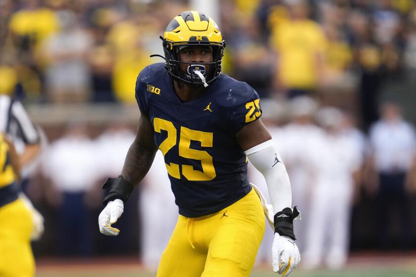 Michigan linebacker Junior Colson plays against UNLV in the second half of an NCAA college football game in Ann Arbor, Mich., Saturday, Sept. 9, 2023. (AP Photo/Paul Sancya)