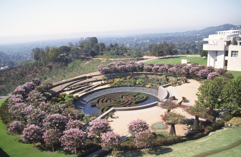A large circular garden with an azalea maze in the middle is seen from above.