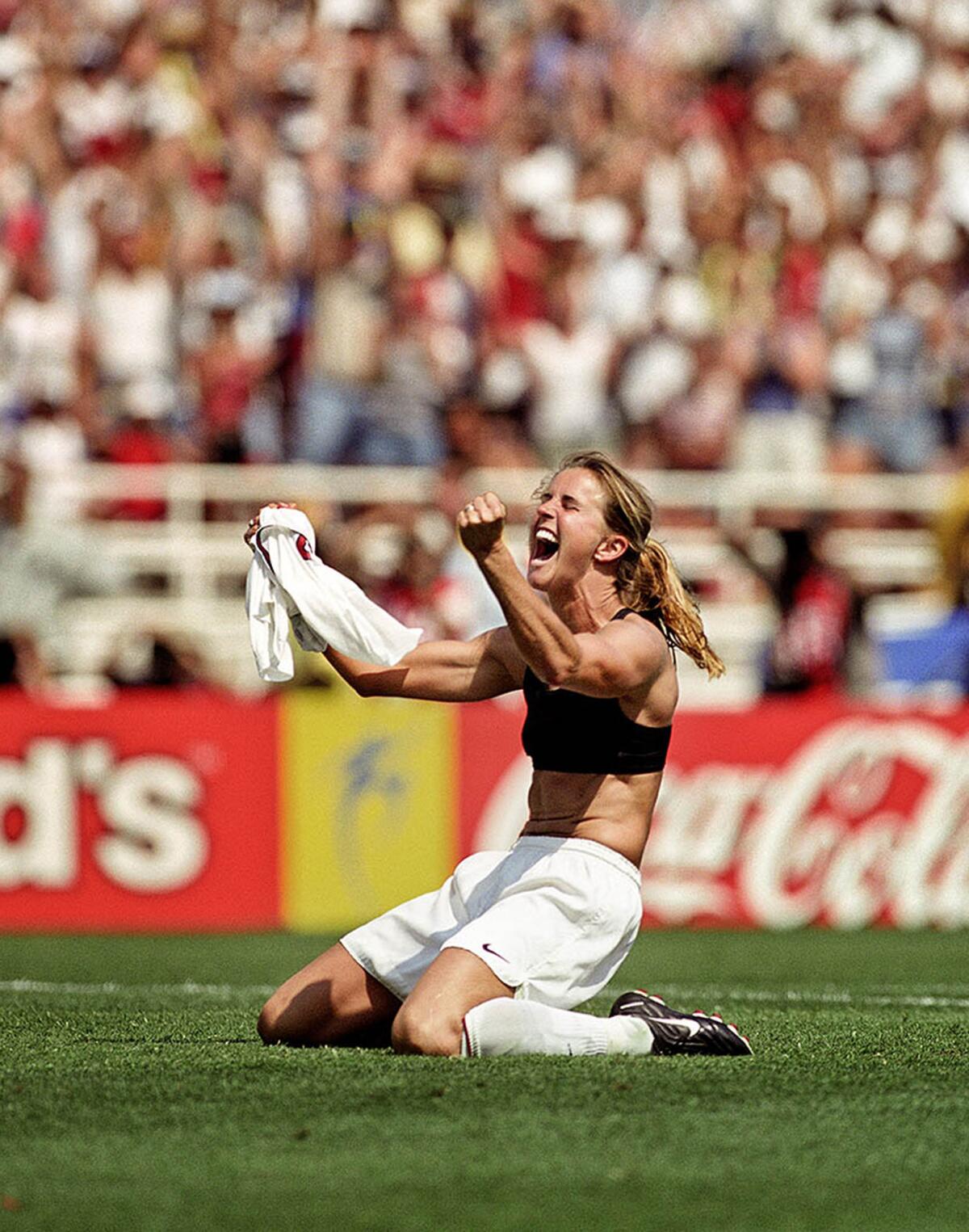World champion Brandi Chastain exults after scoring the winning goal in the United States' 5-4 penalty-kick victory over China in the World Cup final in front of 90,185 at the Rose Bowl in 1999.