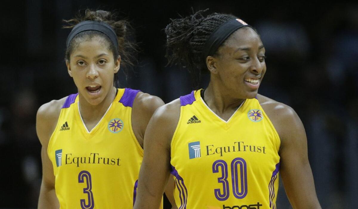 Candace Parker, left, and Nneka Ogwumike have led the Sparks to a 3-0 start.