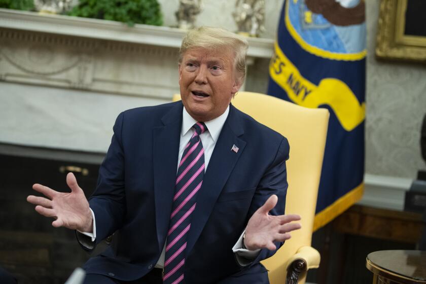 President Donald Trump speaks during a meeting with Rep. Jeff Van Drew, D-N.J., who is planning to switch his party affiliation, in the Oval Office of the White House, Thursday, Dec. 19, 2019, in Washington. (AP Photo/ Evan Vucci)