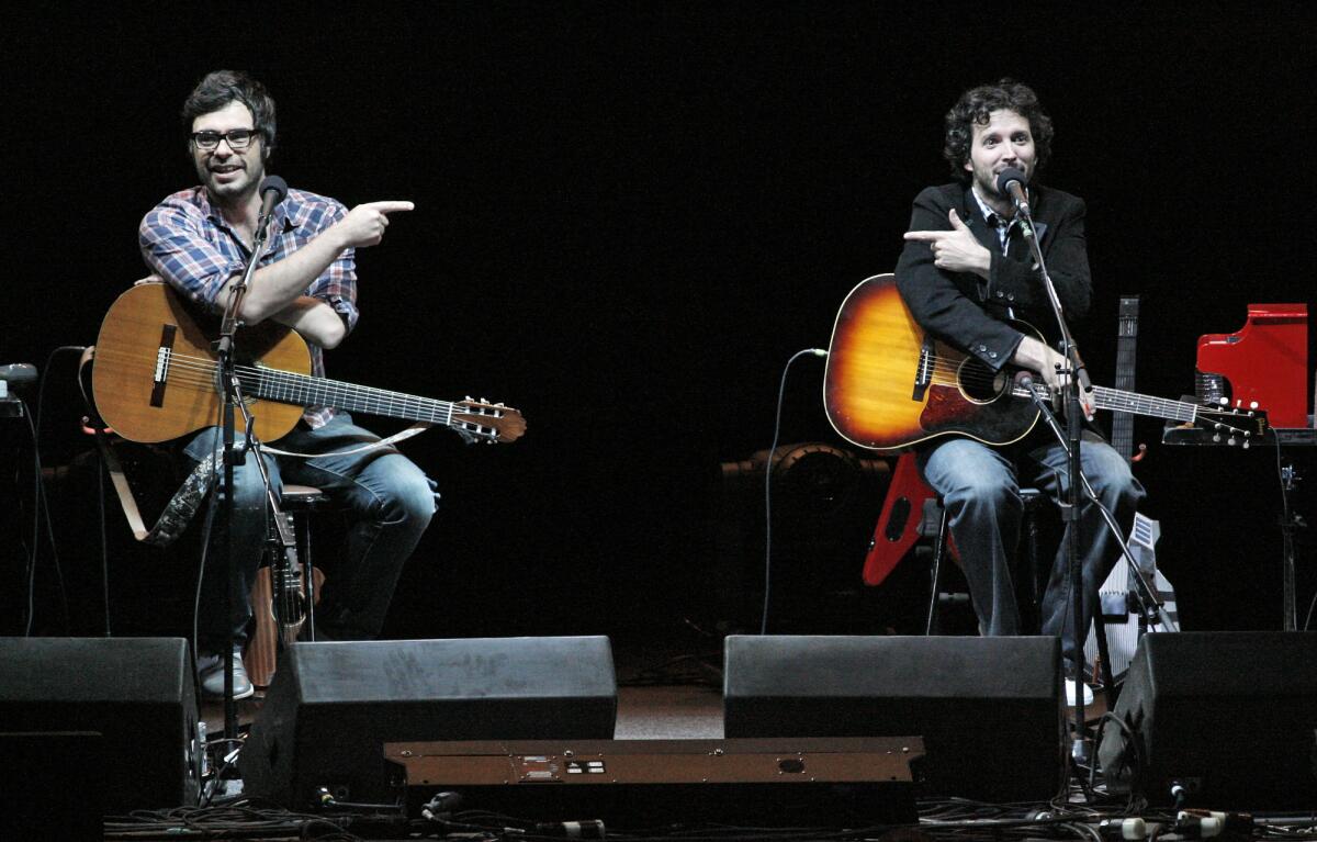 Flight of the Conchords in performance at the Hollywood Bowl on May 30, 2010. (Lawrence K. Ho / Los Angeles Times)