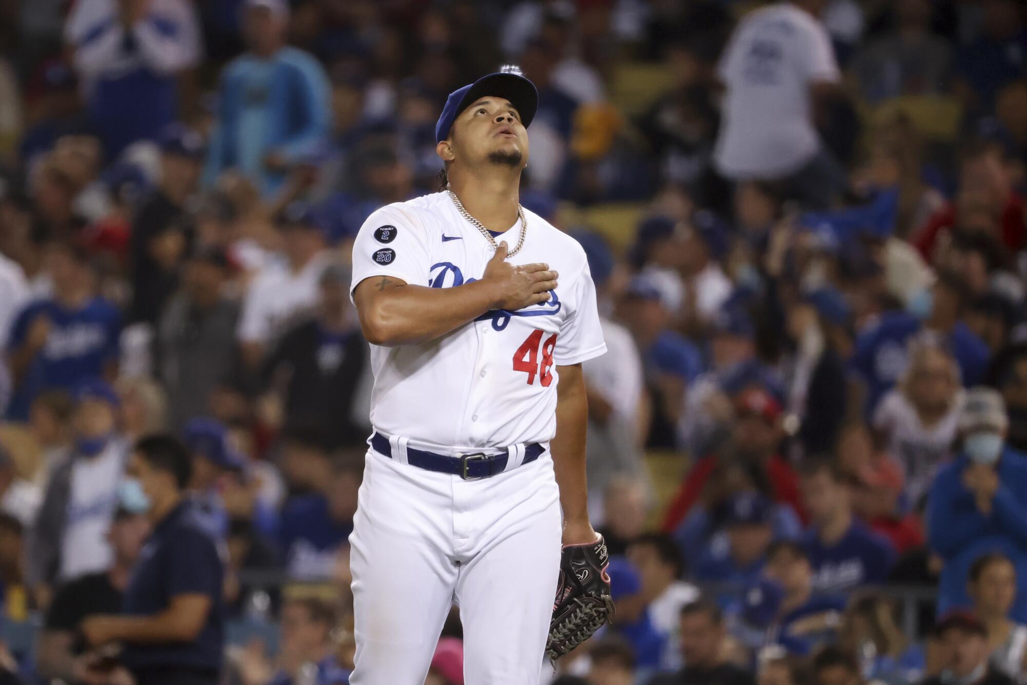 Los Angeles Dodgers relief pitcher Brusdar Graterol celebrates after the last out of the sixth inning
