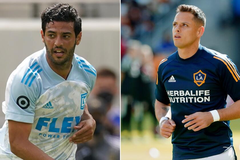 Carlos Vela, left, and Javier "Chicharito" Hernandez were named to the MLS All-Star Game roster.