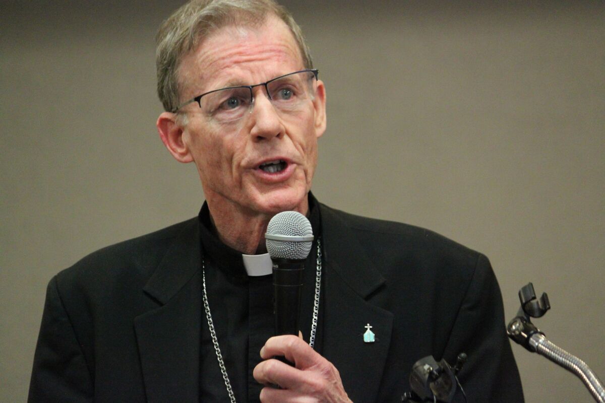 FILE - Archbishop John C. Wester, head of the Archdiocese of Santa Fe, N.M., tells reporters on Nov. 29, 2018, the diocese will be filing for Chapter 11 bankruptcy protection the following week as clergy sex abuse claims have depleted its reserves. The Archdiocese of Santa Fe, one of the oldest Catholic dioceses in the United States, announced a settlement agreement Tuesday, May 17, 2022, to resolve the bankruptcy case. “The church takes very seriously its responsibility to see the survivors of sexual abuse are justly compensated for the suffering they have endured,” Wester said in a statement. (AP Photo/Susan Montoya Bryan, File)
