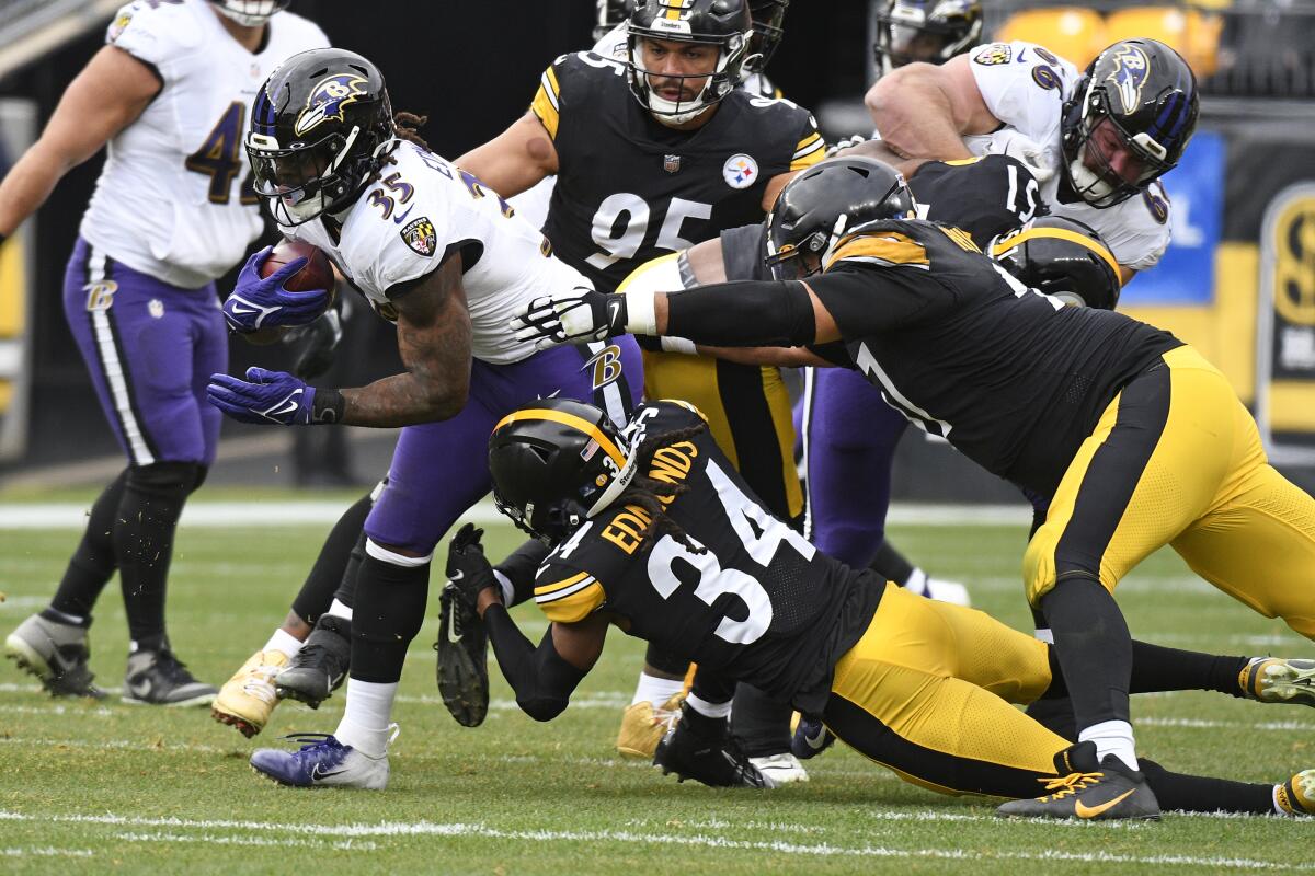 Steelers run D crumbles again as playoff hopes evaporate - The San