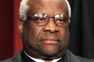 FILE - In this Oct. 8, 2010 file photo, Associate Justice Clarence Thomas is seen during the group portrait at the Supreme Court Building in Washington. Liberals and Democrats in Congress want Justice Thomas off the health care case. Conservative interest groups and Republican lawmakers say it's Justice Elena Kagan who should sit it out. Neither justice is budging — the right decision, according to many ethicists and legal experts. (AP Photo/Pablo Martinez Monsivais, file)