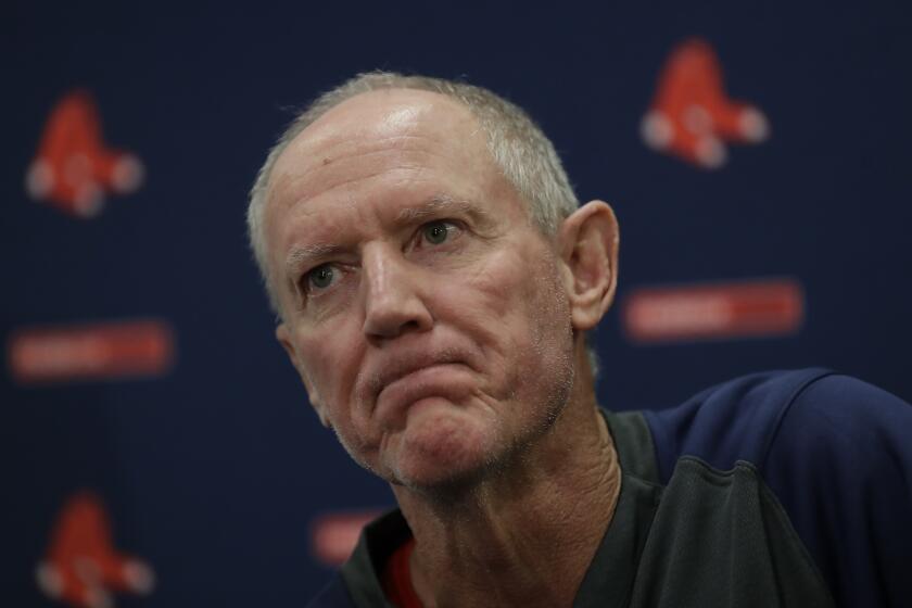 Ron Roenicke speaks after being after being named interim of the Boston Red Sox baseball team Tuesday, Feb. 11, 2020, in Fort Myers, Fla. (AP Photo/John Bazemore)