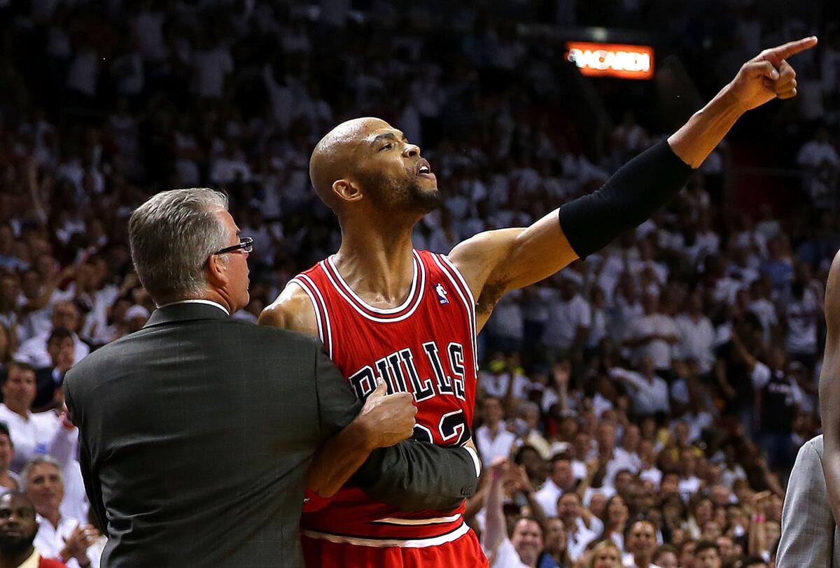 Chicago Bulls forward Taj Gibson continues to yell at the referees after he was ejected in Game 2 of a playoff series against the Miami Heat.