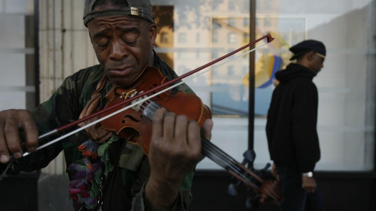 Nathaniel Ayers plays in downtown Los Angeles in 2008.