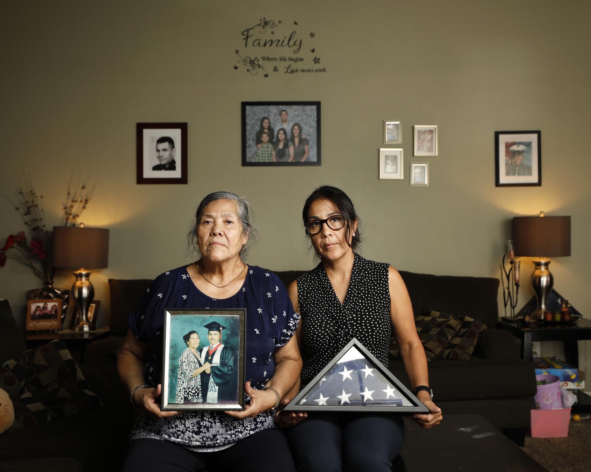 Maria Noriega and her daughter Sonia Jimenez sit in their home in San Diego 