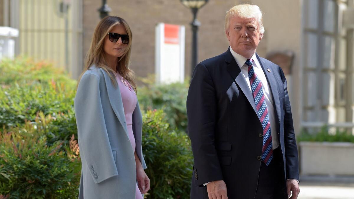 President Trump and First Lady Melania Trump leave after attending services at St. John's Church in Washington on Sunday.