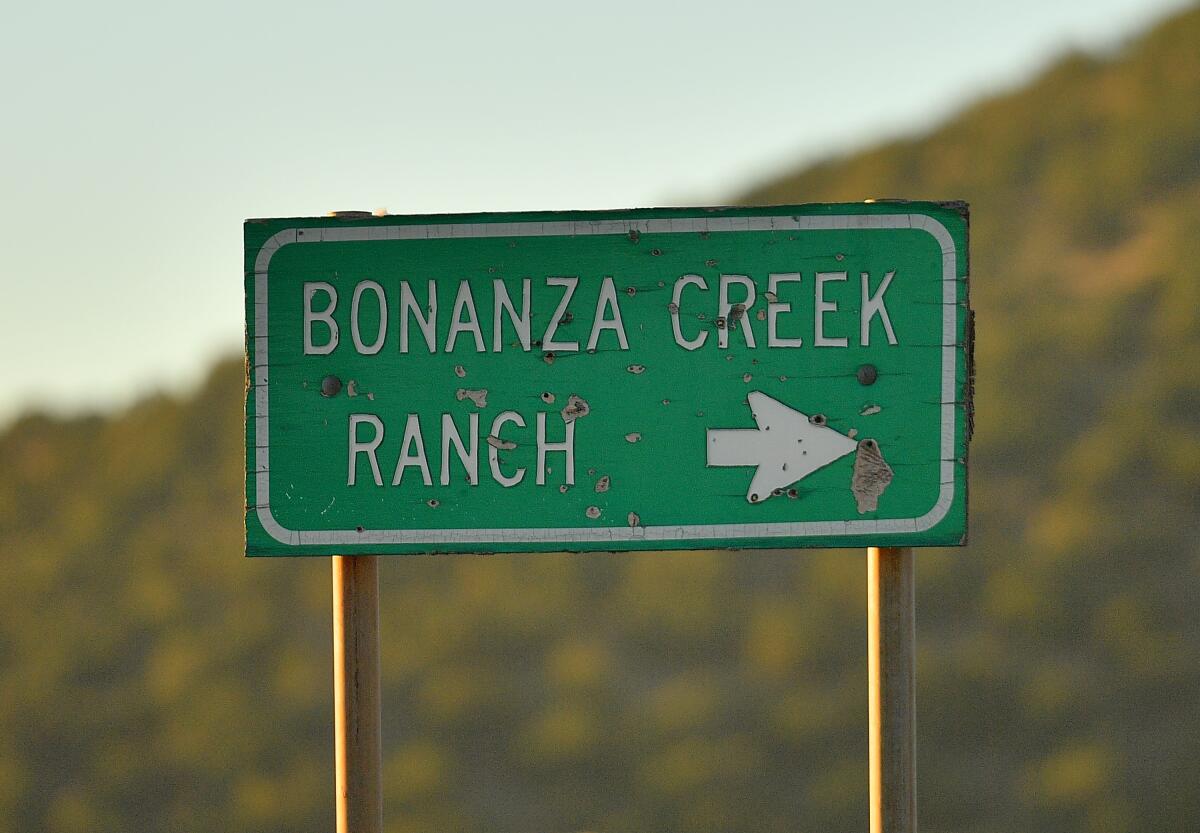 A sign points to the direction of the Bonanza Creek Ranch near Santa Fe, New Mexico. 