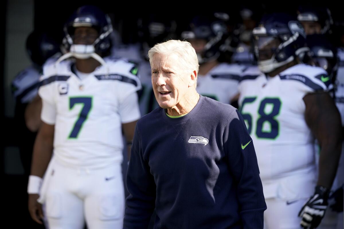 Seattle Seahawks head coach Pete Carroll waits to run onto the field before a game against the Baltimore Ravens.