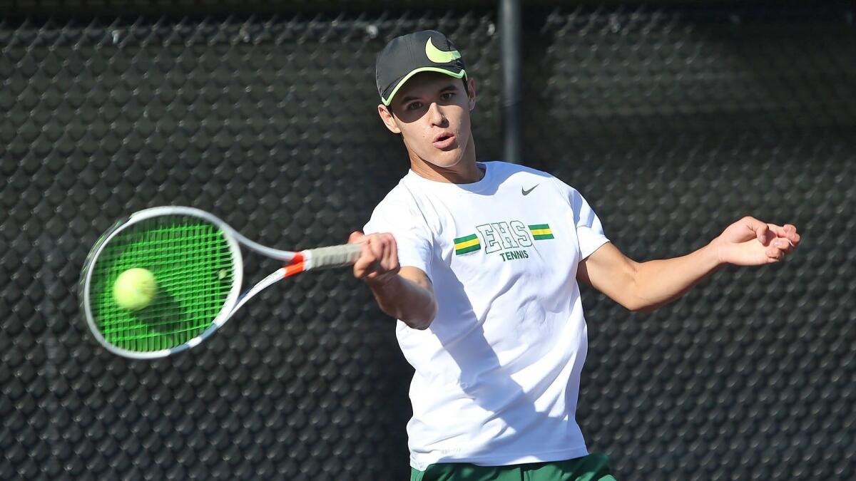 Edison High's Jason You, pictured hitting a forehand winner on March 7 at Laguna Beach, swept in singles for the Chargers in Thursday's 15-3 win over Marina.