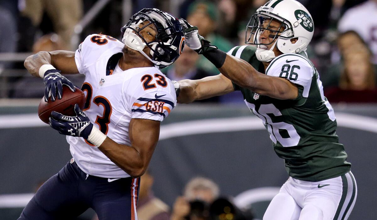 Chicago Bears cornerback Kyle Fuller (23) intercepts a pass in the end zone intended for New York Jets wide receiver David Nelson (86) in the third quarter Monday night.