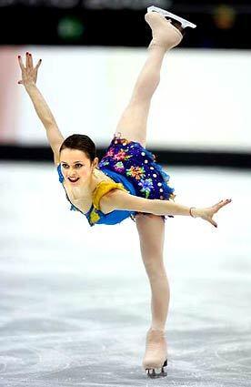 Sasha Cohen glides during the short program of the womens' figure skating competition.