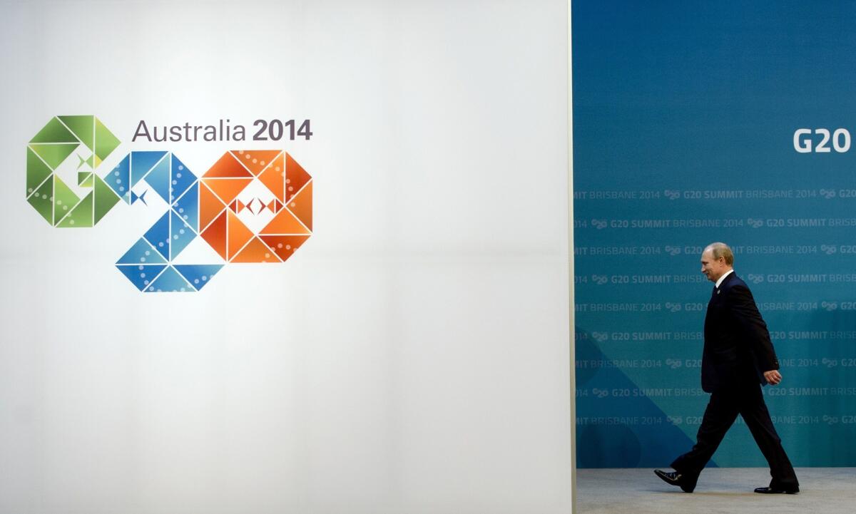 Russian President Vladimir Putin arrives for the G-20 Summit in Brisbane, Australia, on Nov. 15, 2014.