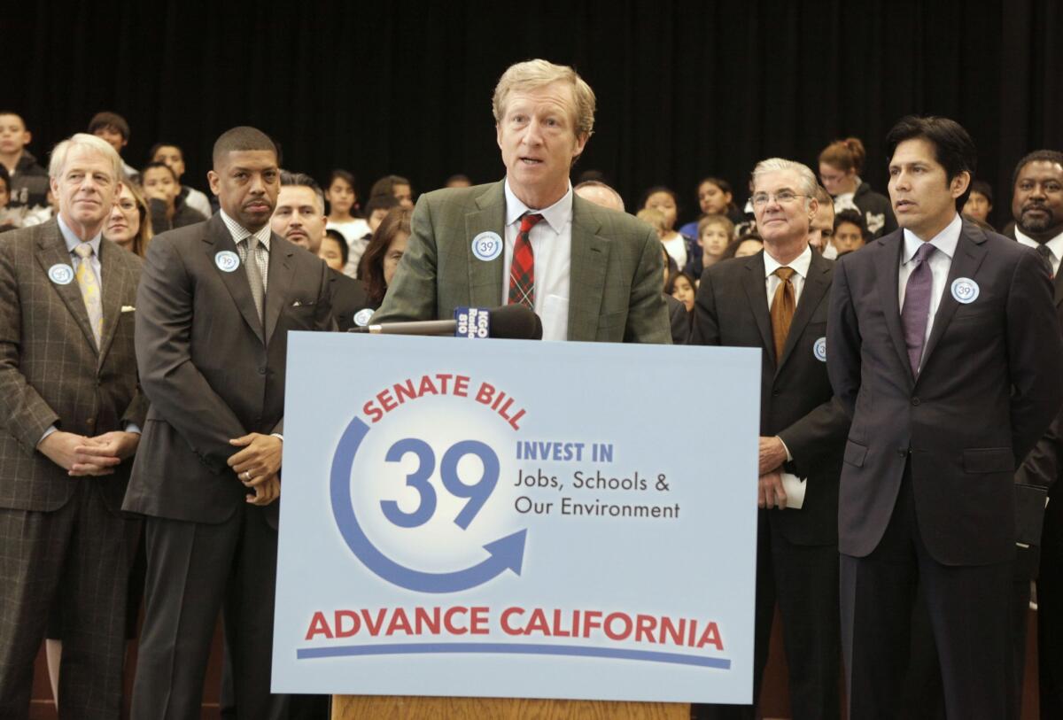 Billionaire Tom Steyer, the chief financier behind the Proposition 39 campaign, discusses a proposed bill to fund energy efficiency projects during a news conference at Mark Twin Elementary School in Sacramento, Calif. in Dec. 2012.