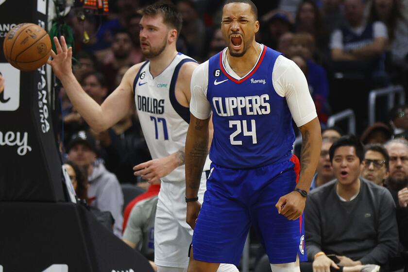 Los Angeles, CA - January 10: Los Angeles Clippers' Norman Powell celebrates a slam dunk against the Dallas Mavericks' Luka Doncic on Tuesday, January 9, 2023 in Los Angeles, CA. (K.C. Alfred / The San Diego Union-Tribune)