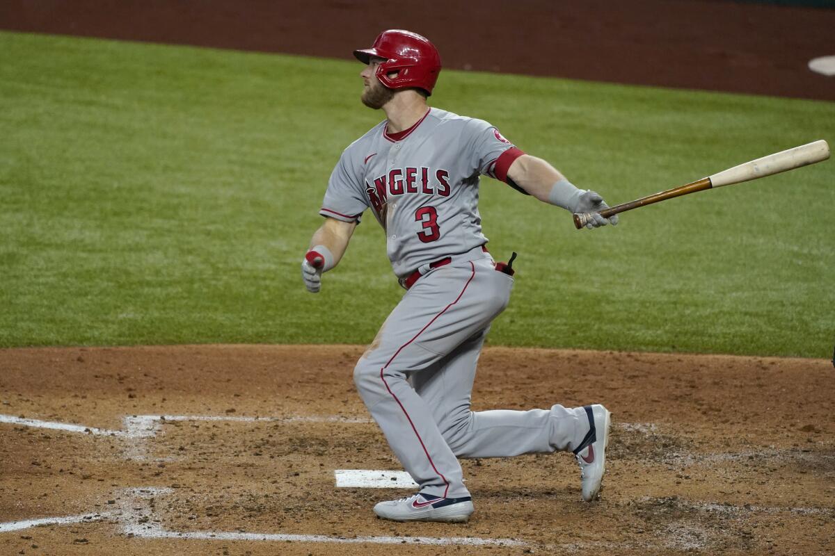The Angels' Taylor Ward follows through on a swing against the Texas Rangers on Sept. 10.