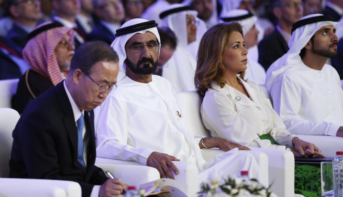 UAE Prime Minister and Dubai ruler Sheik Mohammed bin Rashid al Maktoum, second from left, sits next to his wife Princess Haya bint al Hussein, during the presentation of a U.N. report on funding for humanitarian aid on Jan. 17, 2016, in the Emirate of Dubai.